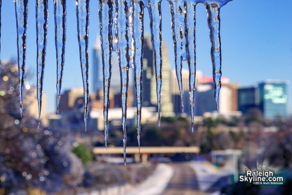 Icicles in front of the Raleigh Skyline