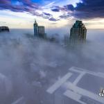 Raleigh rises above the winter fog