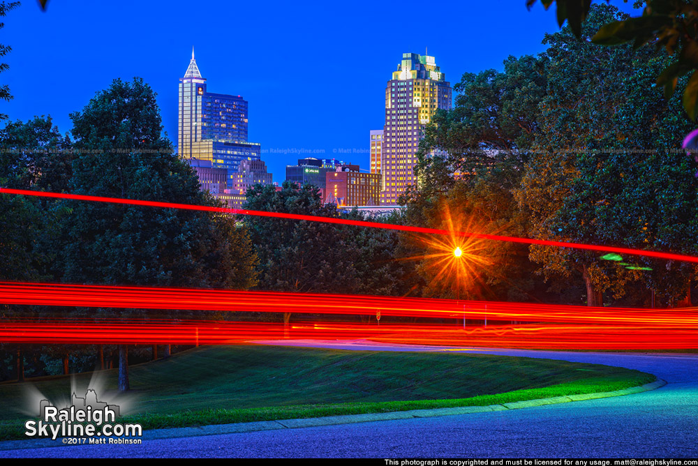 Brake lights through Dorothea Dix Park