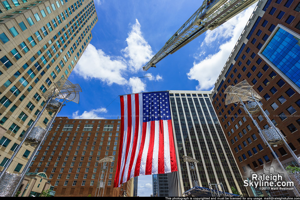 Large American flag over City Plaza and downtown Raleigh on July 4th