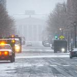 Raleigh Memorial Auditorium fades into the snow