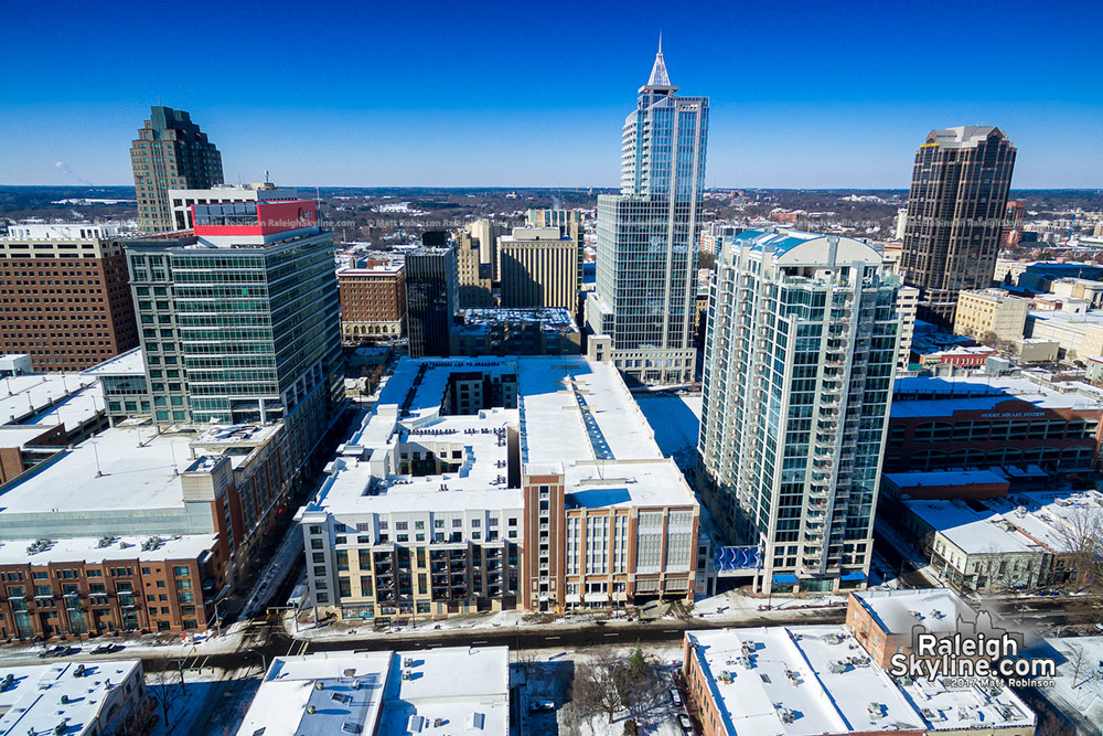 Sunny blue sky with downtown Raleigh after the snowfall