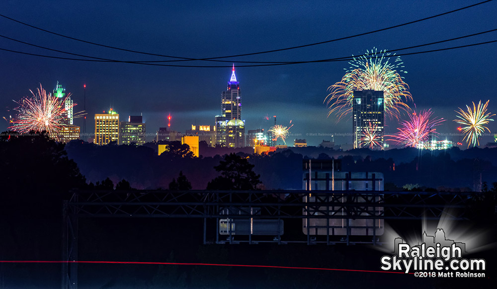 July 4th fireworks exploding all over Raleigh as seen from Knightdale