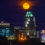 Moon rising over Two Hanover Square from DH Hill Library