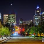 Crescent moonrise over Raleigh skyline from Davie Street