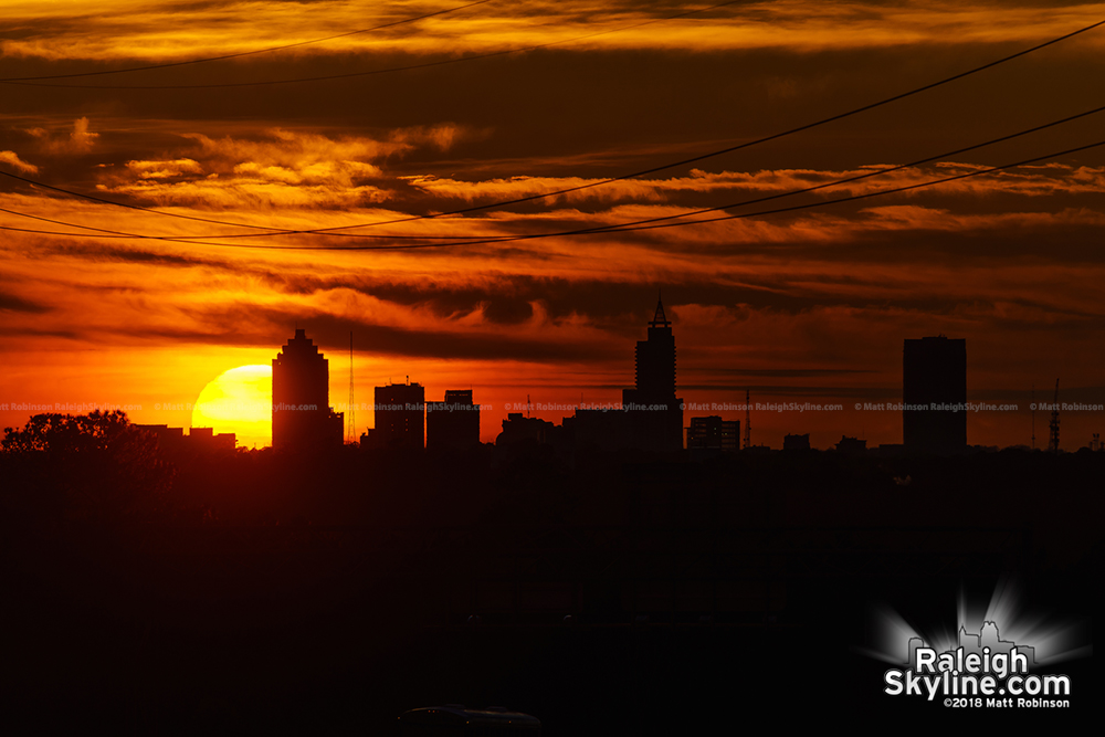 View of sunset behind Raleigh from over 6.5 miles away (near Knightdale)