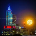 Moonrise behind PNC Plaza from Dorothea Dix Park