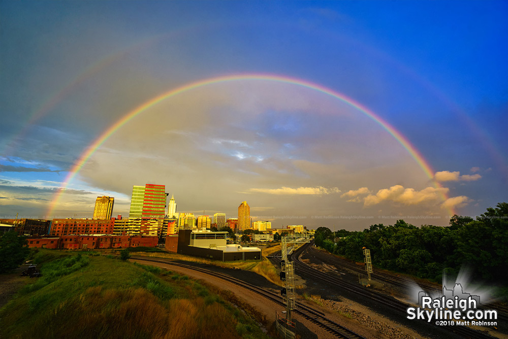 Full double Rainbow over downtown Raleigh skyline