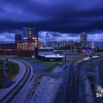 Storm clouds travel over downtown Raleigh and the Boylan Wye