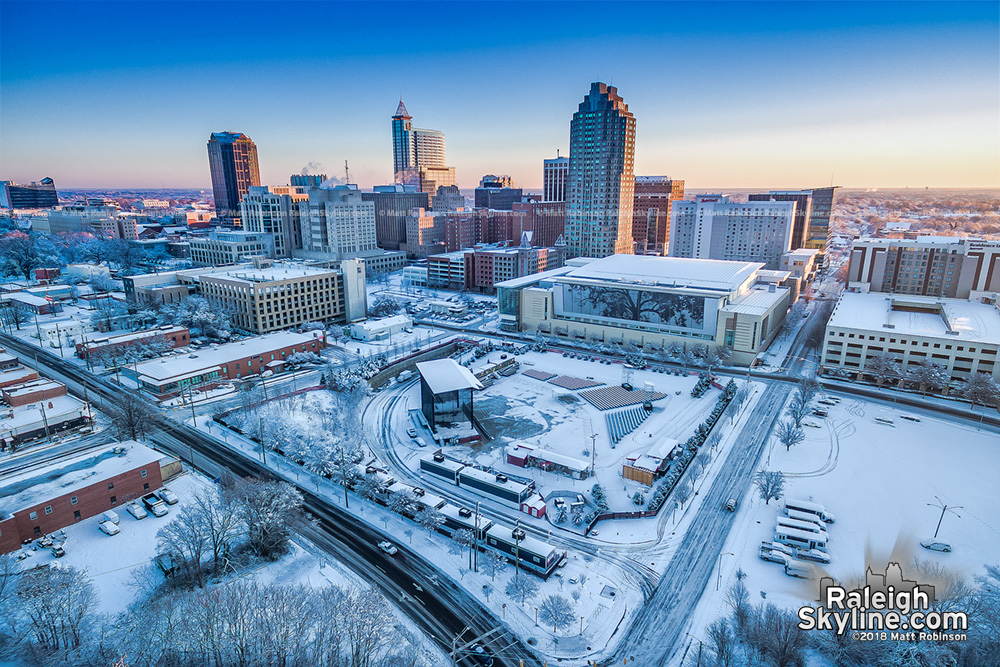 Aerial view of the first morning sun on Raleigh and the snow cover