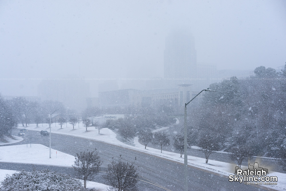 Raleigh barely visible in the falling snow