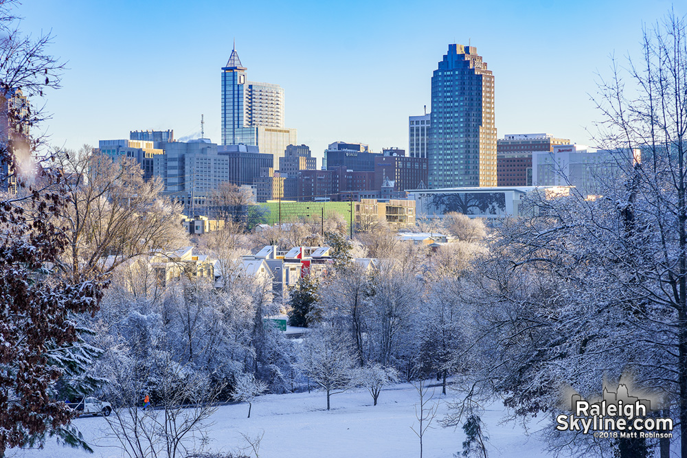 Downtown Raleigh and snow with Clear skies on January 18, 2018