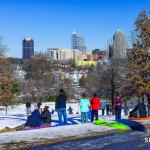 Raleigh tradition of Sledding at Dix Hill after snow