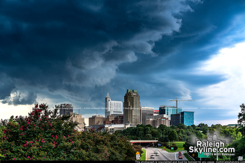 Dramatic clouds behind downtown Raleigh