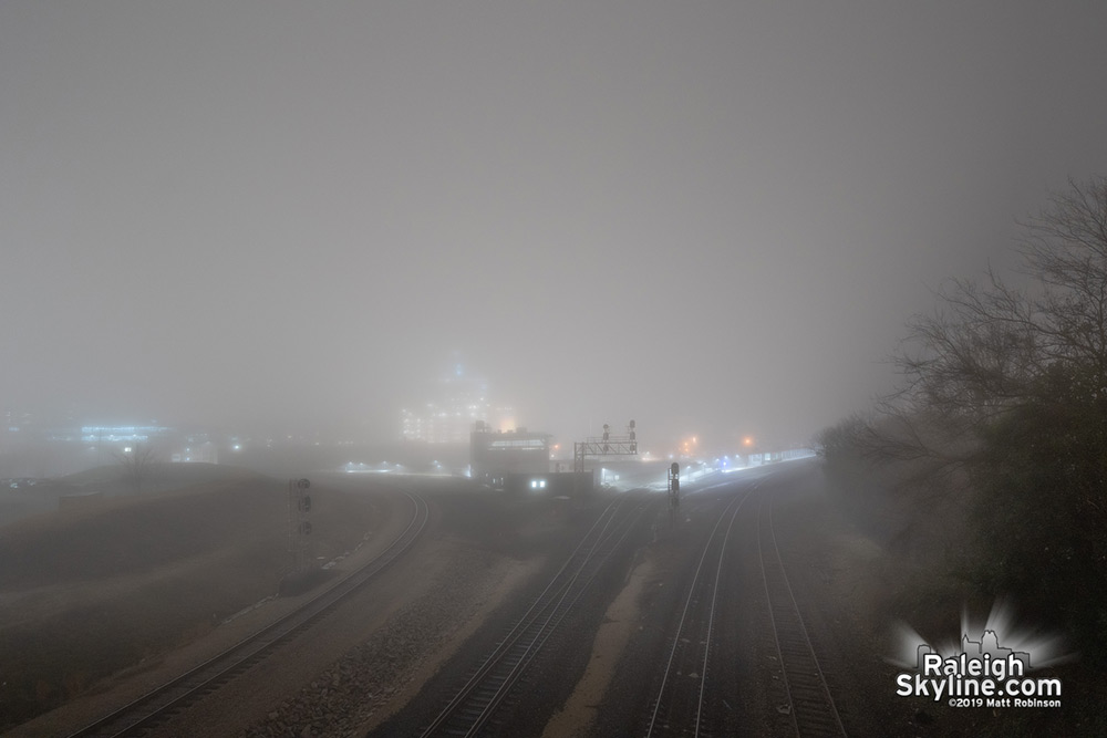 Fog completely obscures downtown Raleigh from Boylan Avenue