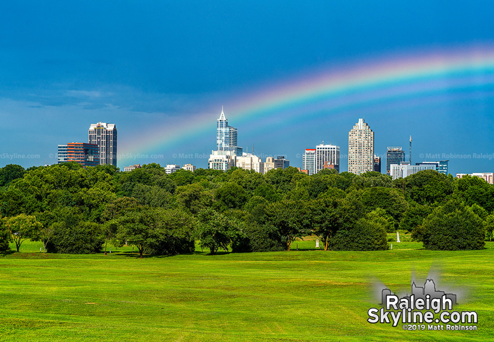 Low slung Supernumerary Rainbows over the downtown Raleigh skyline from Dorothea Dix Park