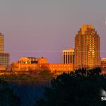 Supermoon at sunset over downtown Raleigh