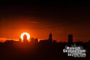 Tracking the setting sun behind downtown Raleigh