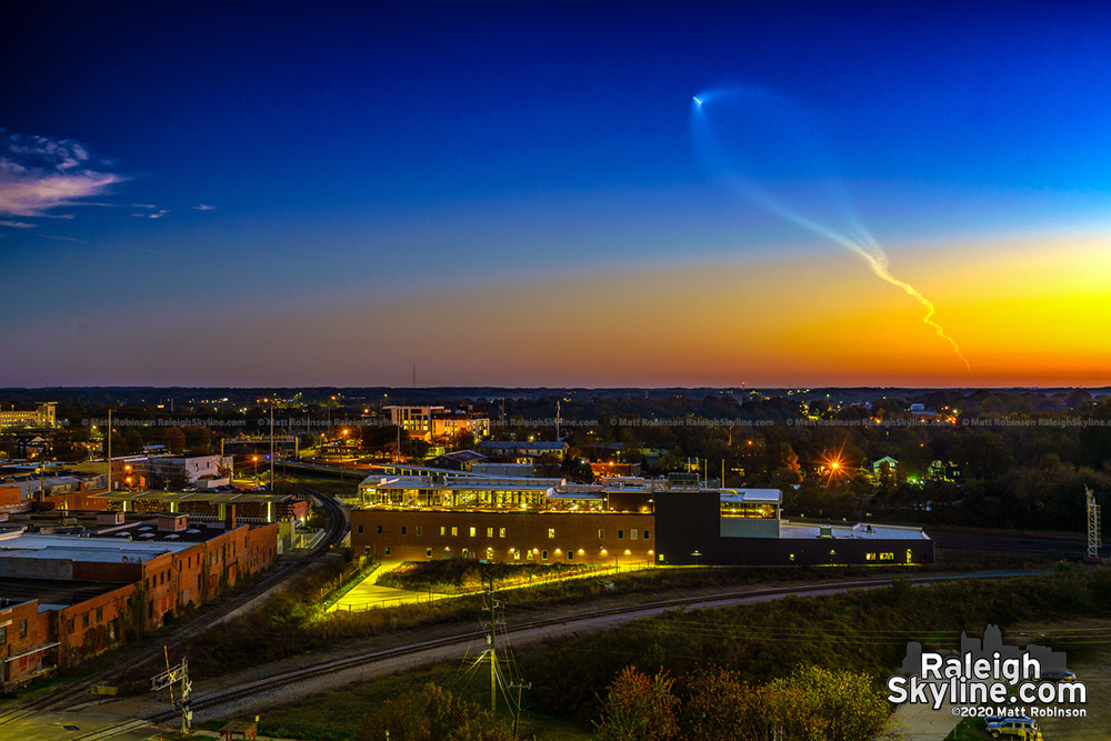 An Atlas V rocket launched into space from Cape Canaveral, Florida was visible from downtown Raleigh at sunset on November 13, 2020, seen here over Raleigh's Union Station.