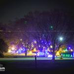 Christmas lights at Dix Park with downtown Raleigh