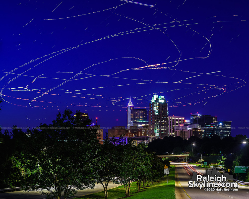 3 helicopters circle over downtown Raleigh