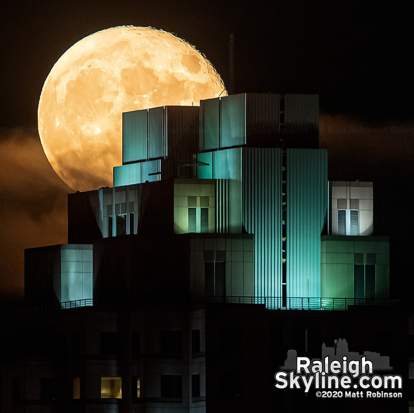 99.7% full moon rise over downtown Raleigh 