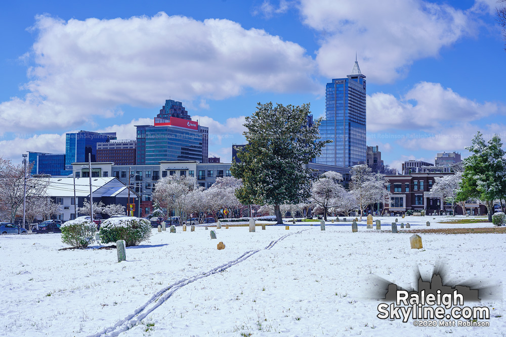 Raleigh City cemetery view of the skyline in the snow