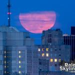 An elusive "worm" supermoon rises over the 78 year old Wake County Office Building in downtown Raleigh on March 9, 2020