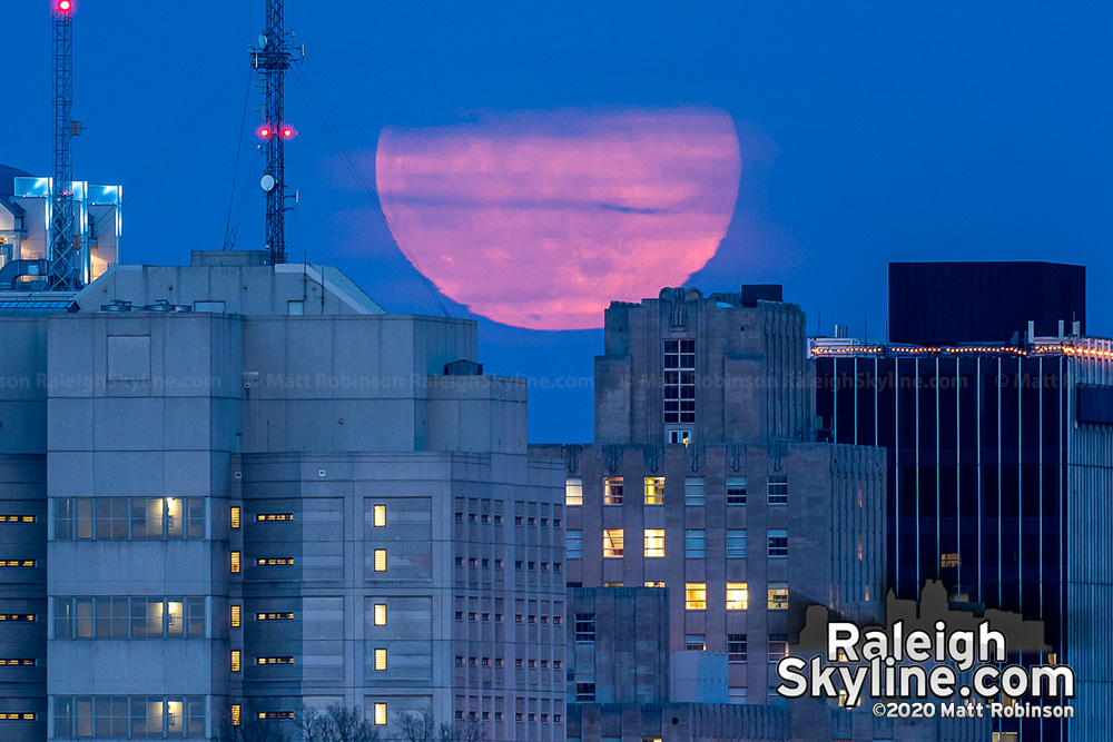 An elusive "worm" supermoon rises over the 78 year old Wake County Office Building in downtown Raleigh on March 9, 2020