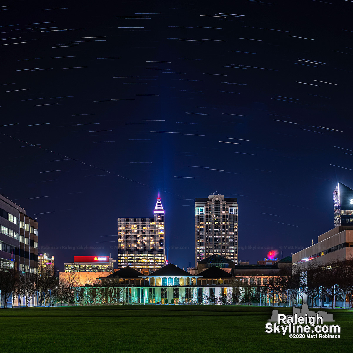 Star trails over downtown Raleigh skyline