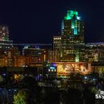 Downtown Raleigh buildings illuminated amber to remember the lives lost to Covid-19