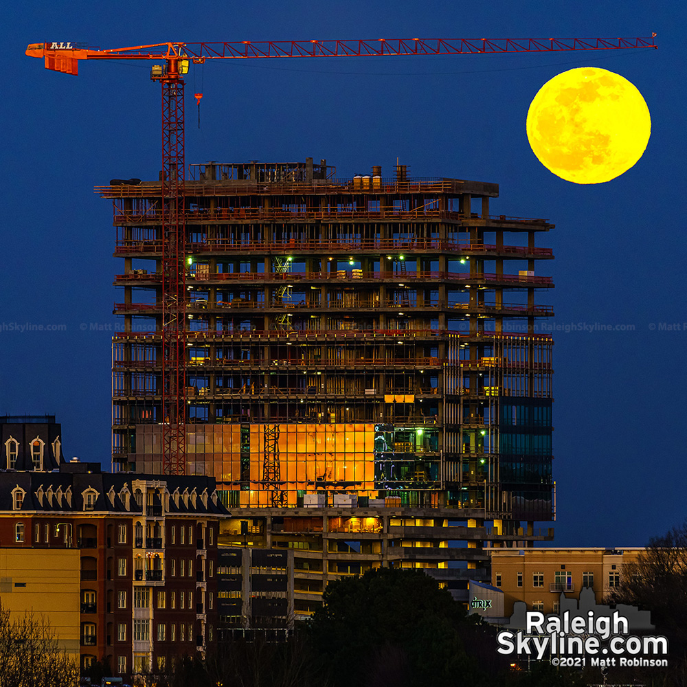 Raleigh Crossing tower rising with the moon