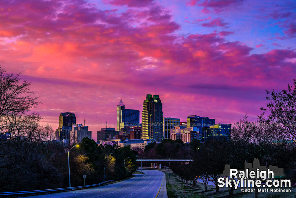 Colorful pink and purple sunset with downtown Raleigh