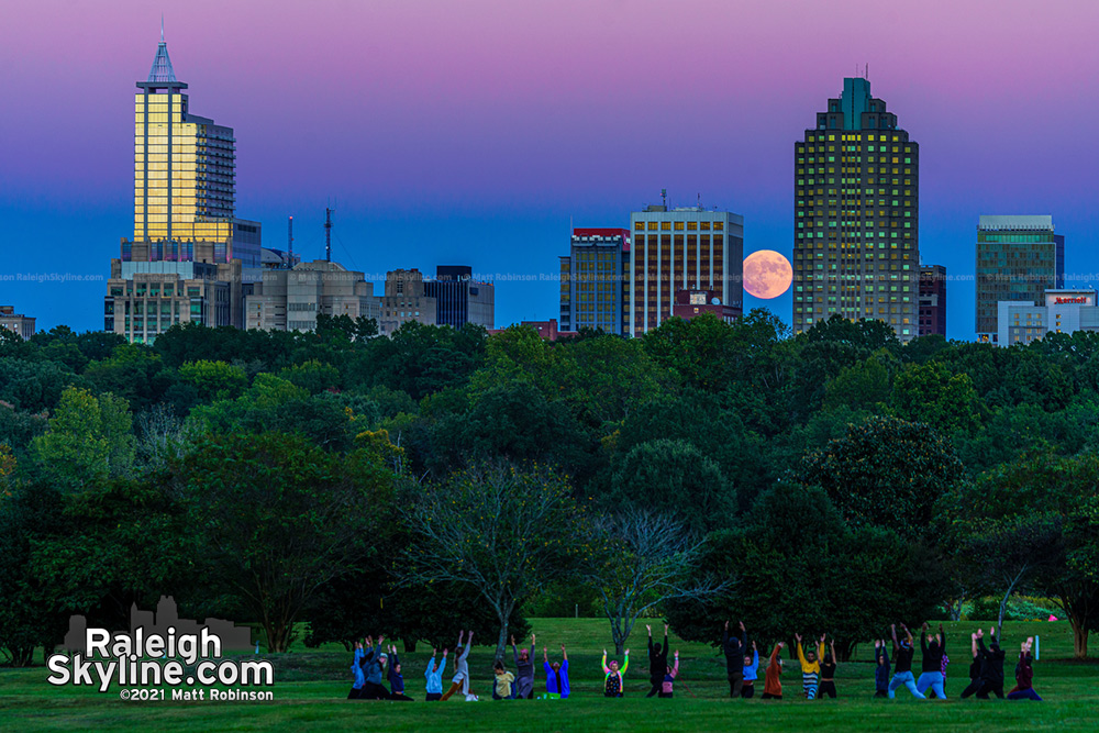 Doing yoga at Dix Park during the moonrise