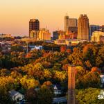 Fall colors at Sunset with Caraleigh Mills and downtown Raleigh