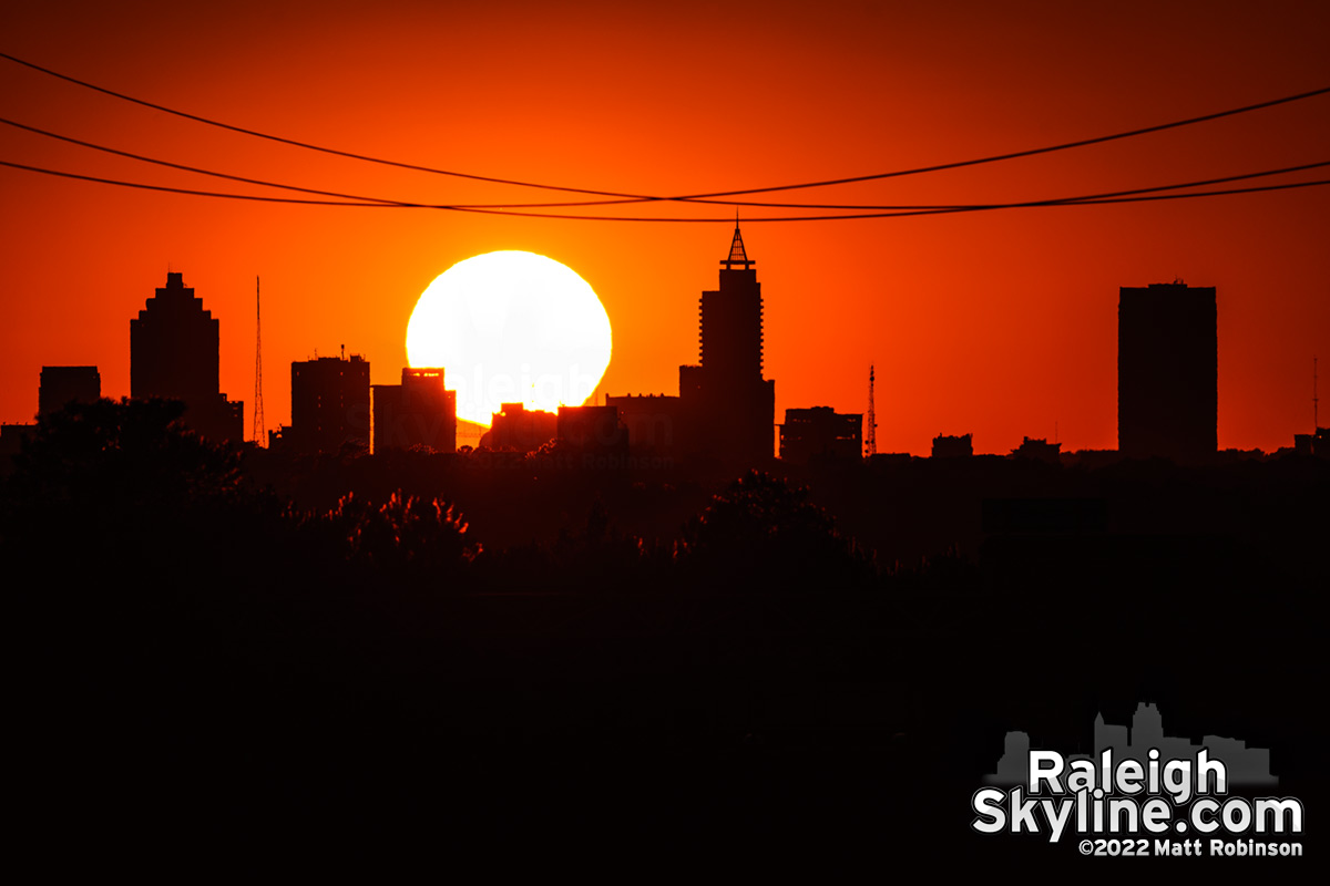 Sunset aligning with downtown Raleigh from 7 miles away