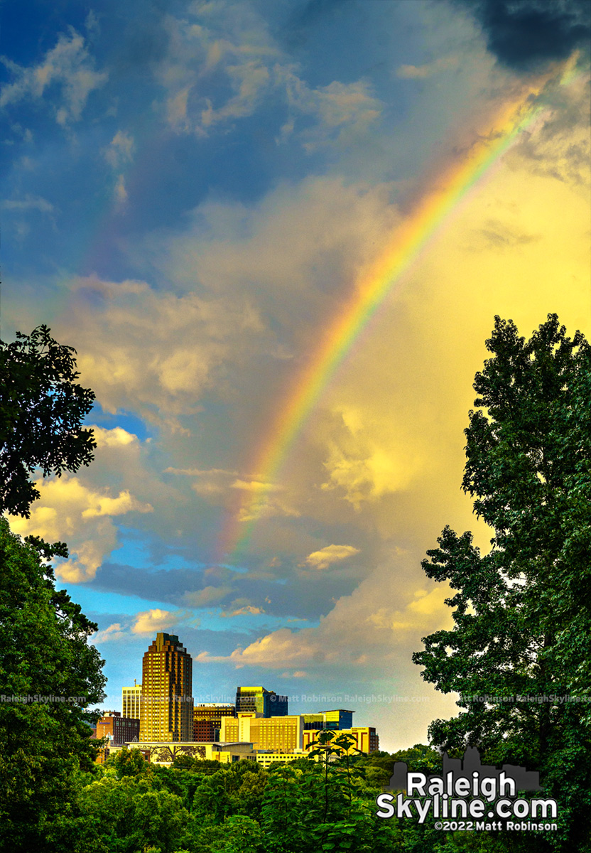 An August rainbow at sunset greets downtown Raleigh