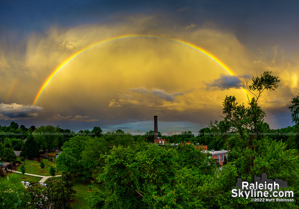 Full rainbow at sunset of the Caraleigh neighborhood with Caraleigh Mills 