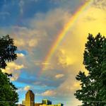 An August rainbow at sunset greets downtown Raleigh