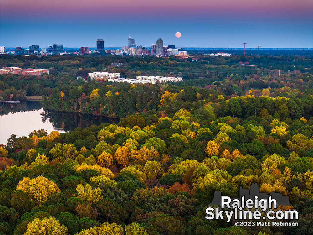 Moon rise with fall colors over Lake Raleigh