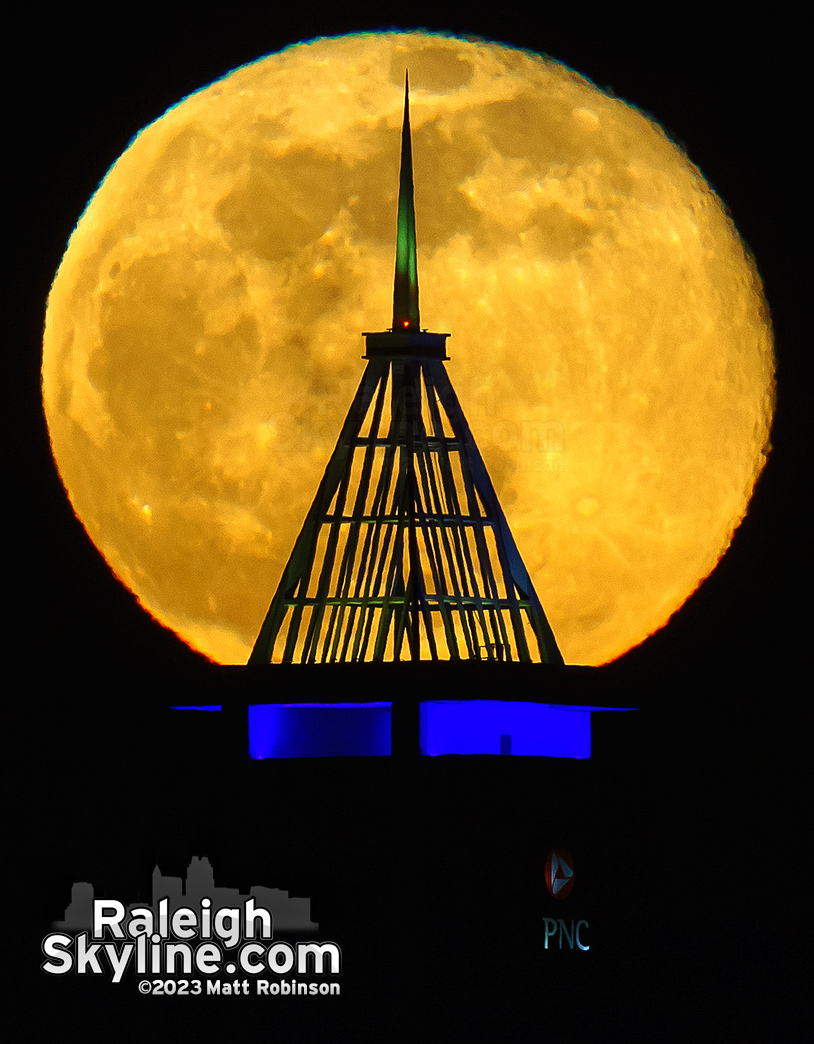 99.9% Full Moon rising behind Raleigh