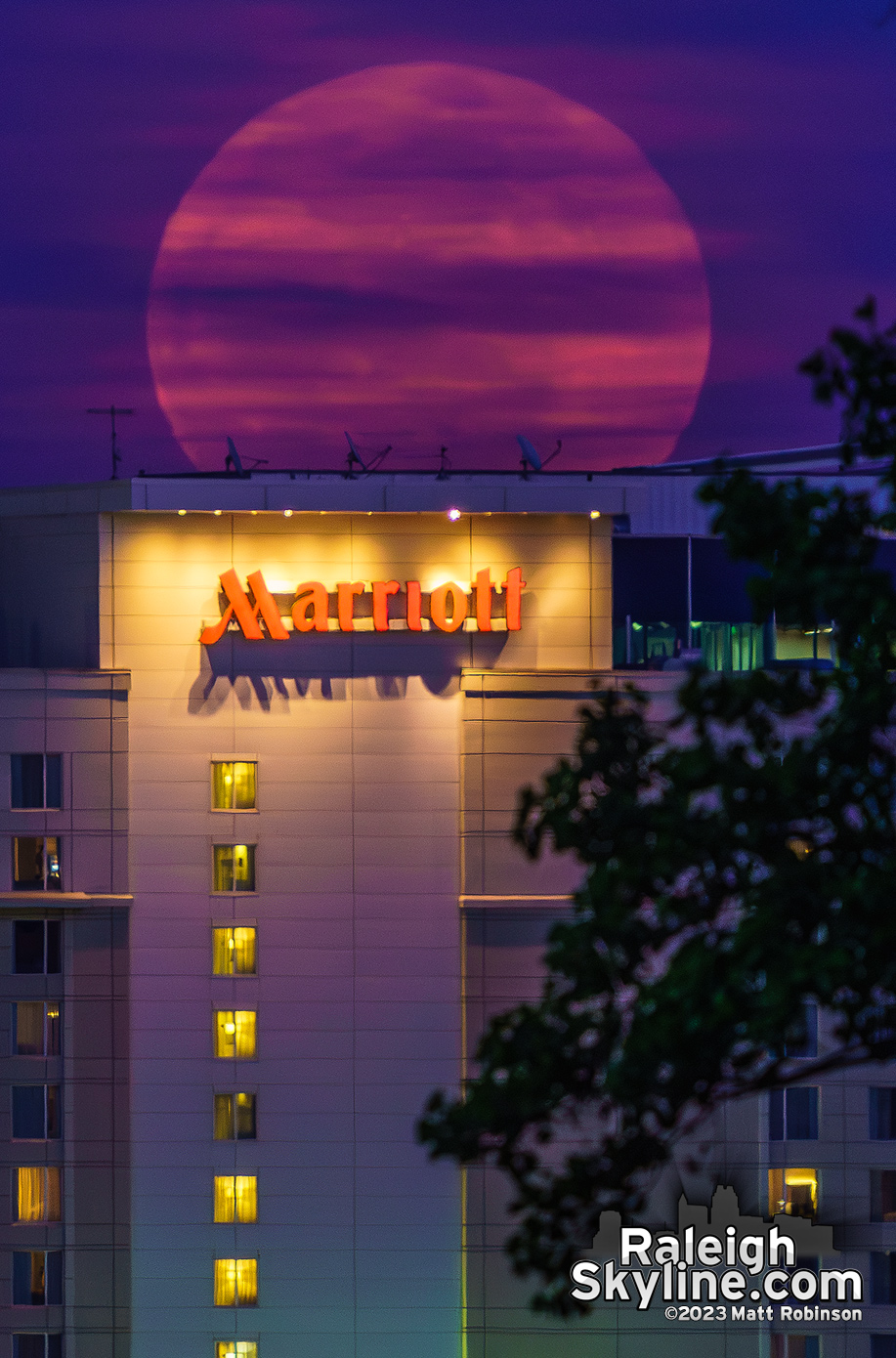 Moonrise behind the Raleigh Marriott