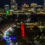 Downtown Raleigh and the NCSU Bell Tower lit up Red for Men's and Women's Basketball making the Elite 8