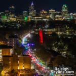 Downtown Raleigh and the NCSU Bell Tower lit up Red for Men's and Women's Basketball making the Elite 8