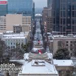 Looking down Fayetteville Street with snow